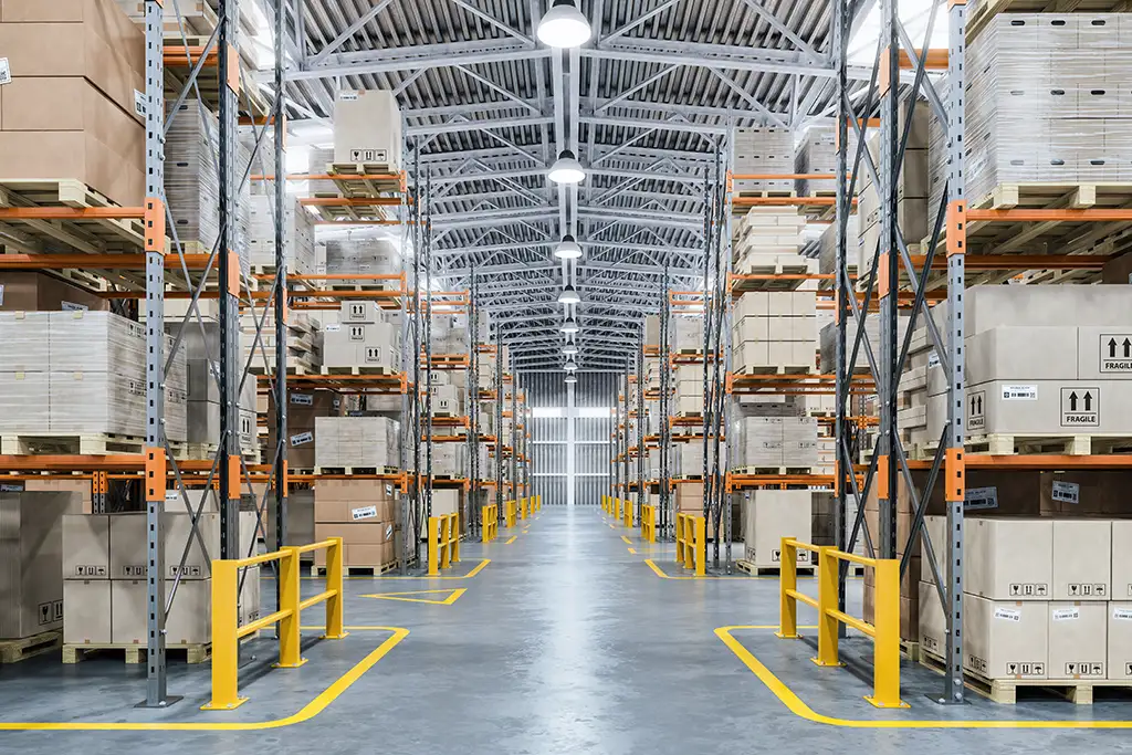 Organized warehouse aisle with pallet racking systems supporting efficient material handling operations